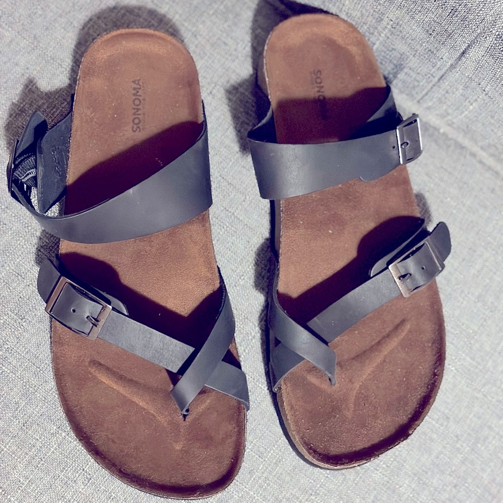 Women’s Black sandal size 9 1/2. Leather straps. Almost NO wear. Like BIRK. $12